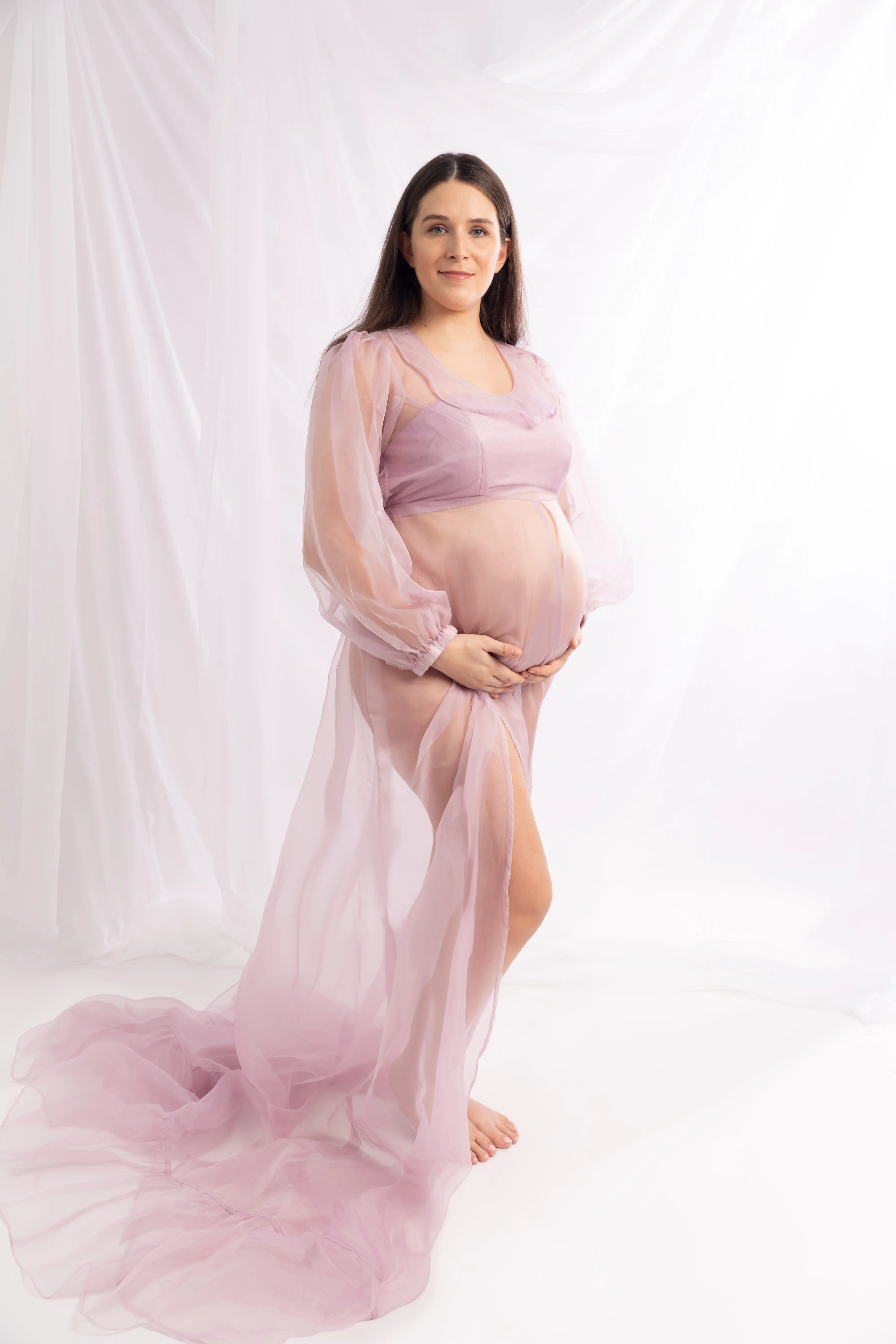 Red drape maternity photoshoot Sharjah