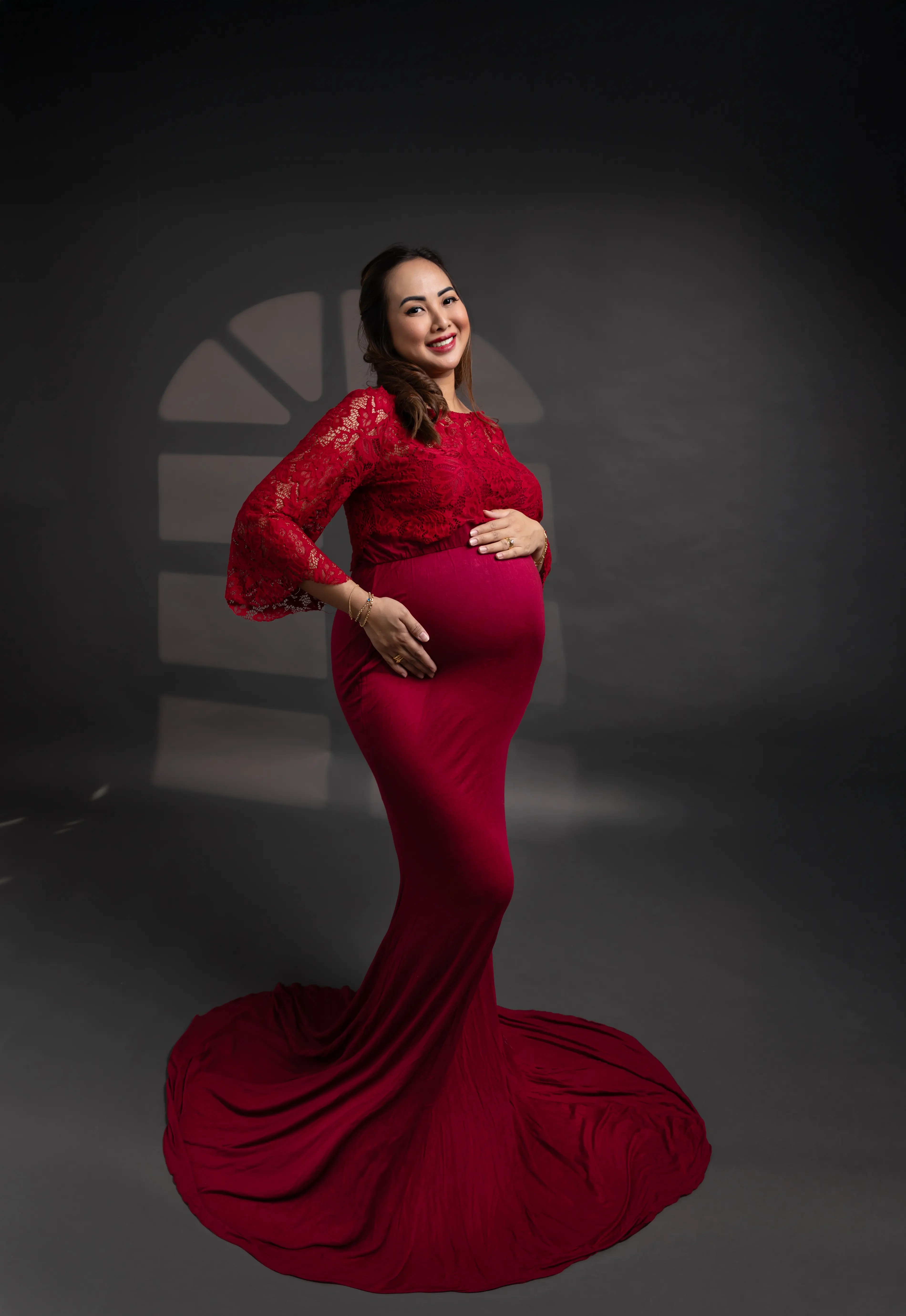 Golden hour maternity portrait beach