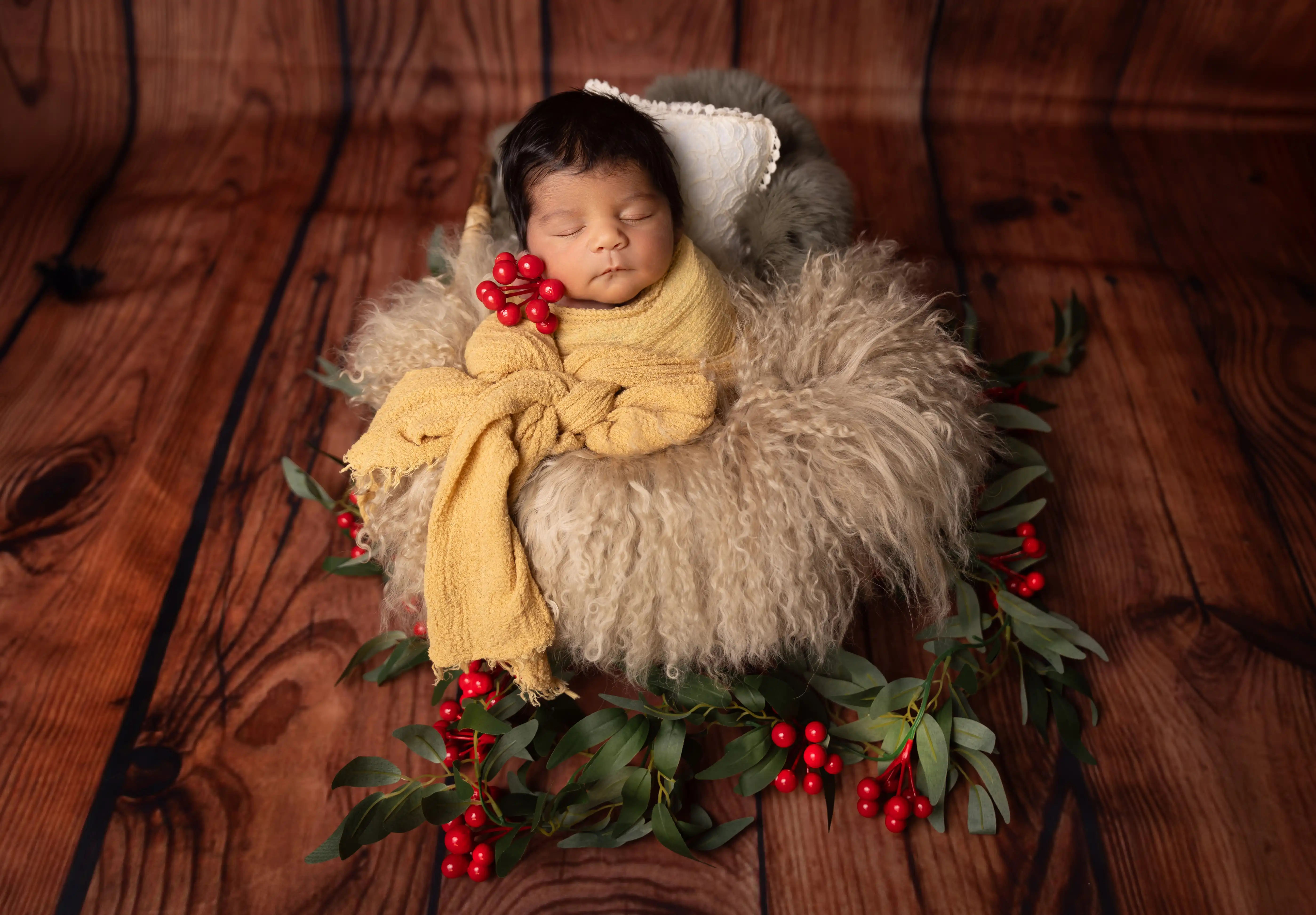 Newborn girl wrapped photos Dubai home session